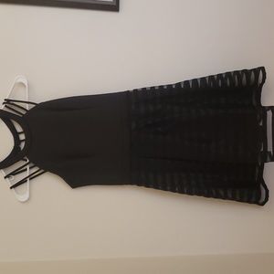 Guess black formal A-line dress with strap detail in the back. Size 6.